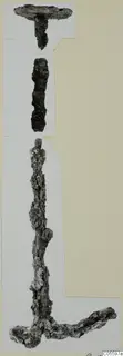 Three corroded iron objects from Marion, Tomb 58, mounted on a card.