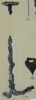 Corroded iron tools from Marion, Tomb 58, shown as photographs mounted on a card