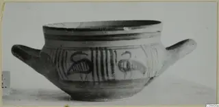 Two-handled bowl from Amathus with dark painted bands and hooked motifs on its side
