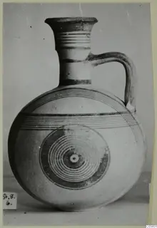 Jug with a flaring rim and strap handle, Pottery Bichrome III, with concentric rings on the body