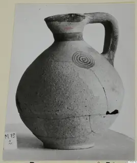 Pottery jug from Marion with a loop handle and concentric circles painted on the shoulder