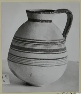 Jug with a single strap handle and dark painted horizontal bands, Pottery White Painted III-1 from the Stylli series