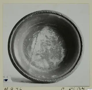 Bowl from Marion seen from above, showing its dark interior and beaded rim