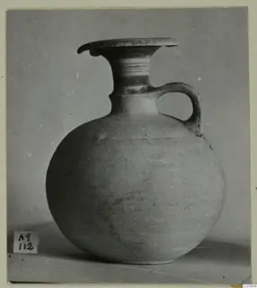 Jug of Pottery Polychrome III-VII from Amathus, tombs 1–9 series, with a flaring neck and single strap handle