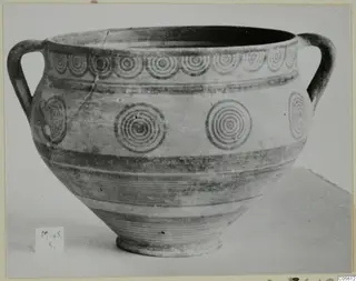 Two-handled bowl with painted concentric circles and horizontal bands
