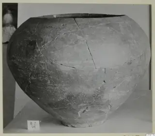 Red Slip pottery vessel from Amathus with a broad, rounded body and a short foot.