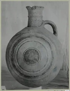 Jug with a tall neck and concentric painted bands on its body, from Amathus