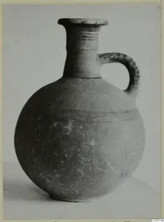 Round-bodied jug with a ridged loop handle and dark banded lines, Pottery Black-on-Red I-III from Amathus