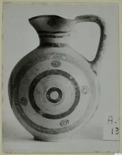 Black-on-Red juglet from Amathus with concentric circle decoration, seen from the side