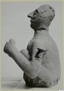 Terracotta Proto-Cypriote I: seated figure in profile, one fist raised, cracked and partly broken