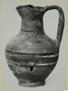 Jug with a pinched mouth, single strap handle and dark painted bands, from Marion tombs 1–30