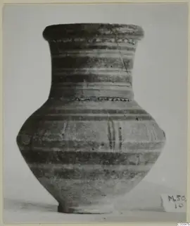 Pottery jar with a flared rim, narrow neck and horizontal bands, seen from the side
