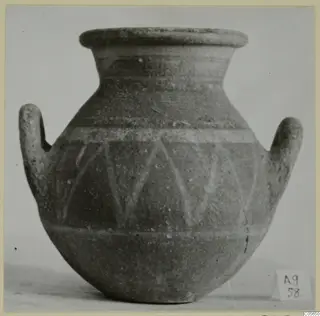 Two-handled pottery jar with a painted band of diagonal strokes, from Amathus