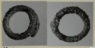 Two photographs of a corroded silver ring from the Marion finds from tombs 31–45