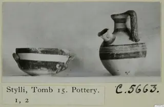 Two pottery vessels from Stylli, Tomb 15: a shallow bowl and a juglet with a strap handle and banded decoration