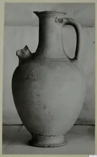 Pottery Plain White VII jug with a loop handle and side spout, from the tombs 46–60 finds at Marion
