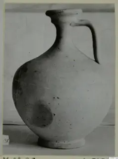 Pottery Plain White VII jug with a single strap handle and a flat-topped rim, seen from the side.
