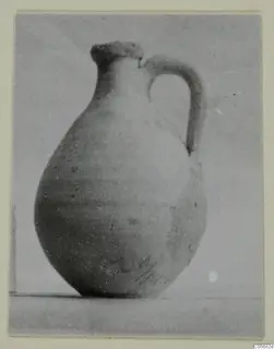 Pottery juglet with a single handle, Plain White VI, shown against a plain background