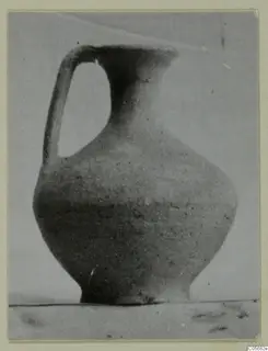 Pottery Plain White VI jug with a single handle and a flared rim
