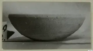 Pottery Plain White VI bowl, shallow and wide, photographed from the side against a pale background