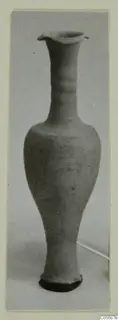 Tall pottery vessel with a flared rim, long neck and tapering base, from the Marion tomb finds