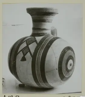 White Painted I jug from Amathus with banded and concentric circle decoration on a globular body.