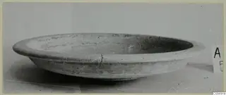 Pottery White Painted IV bowl from Amathus, shown from the side