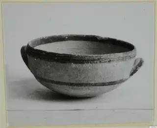 Pottery White Painted II bowl from Amathus with two small loop handles and dark painted bands