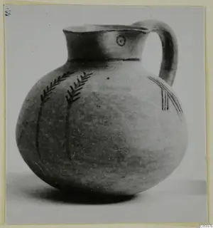 Pottery White Painted IV jug from Amathus with dark painted sprig motifs on a pale globular body