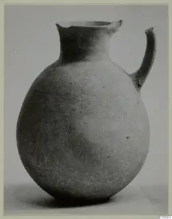 Pottery Plain White IV-V jug from Amathus, shown in side view