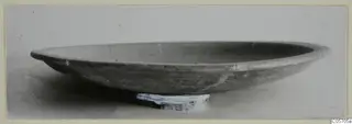 Red Slip plate, a shallow open dish seen from the side against a pale background