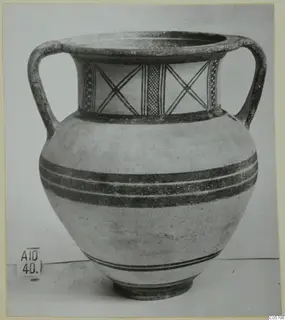 White Painted II two-handled vessel from Amathus, with dark painted bands on the body and criss-cross panels on the neck