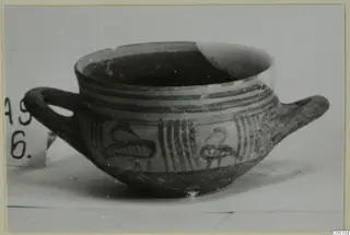 Pottery Special Wares bowl from Amathus with two handles, painted bands and two stylised birds