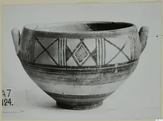 Pottery bowl with two small handles and painted bands, crossed-line and lozenge motifs, from Amathus tombs 1–9 finds