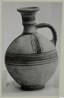 Pottery Bichrome II jug from Amathus with a single handle and painted bands