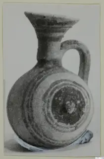 Small jug with a flaring mouth, one loop handle and dark painted bands, from Amathus tombs 10–26