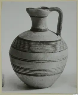 Pottery Black-on-Red I-III jug with one handle and dark painted horizontal bands
