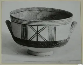 Pottery Bichrome III bowl with two handles, painted bands and panels of vertical lines and crossed lines