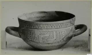 Two-handled bowl with zigzag and hatched bands of decoration on its body