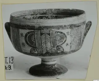 Footed bowl with two handles, painted with vertical stripes, chevrons and concentric semicircles