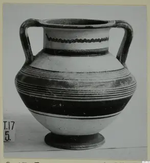 Pottery Bichrome IV amphora-crater, a two-handled vessel with dark painted bands and a wavy line on the neck.