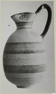 Juglet with a single handle, painted horizontal bands and ring motifs on the rim and shoulder