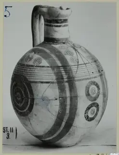 Pottery Bichrome IV jug with a round body, banded paint and concentric circle motifs