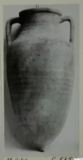Two-handled pottery jar with a flat rim and tapering body, photographed upright against a grey backdrop