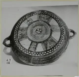 Pottery Black Slip Bichrome bowl with two loop handles, decorated with radiating bands and concentric circles