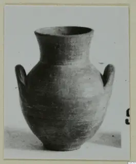 Two-handled jar of Grey Polished Ware, photographed against a plain light background