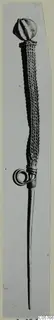 Long pin with a ribbed ball head, a braided shaft and a coiled wire loop near the lower end.