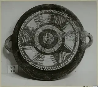 Pottery Black Slip Bichrome bowl with two loop handles, seen from above