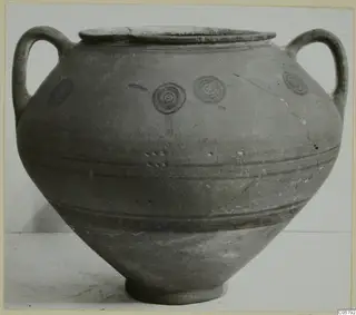 Two-handled jar with painted concentric circles and horizontal bands, from Marion