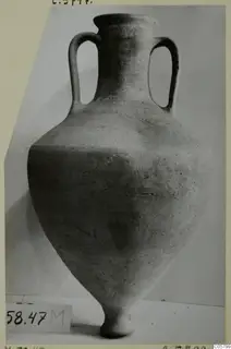 Pottery Plain White VI, a two-handled jar from the Marion tombs 46–60 series, photographed against a pale backdrop